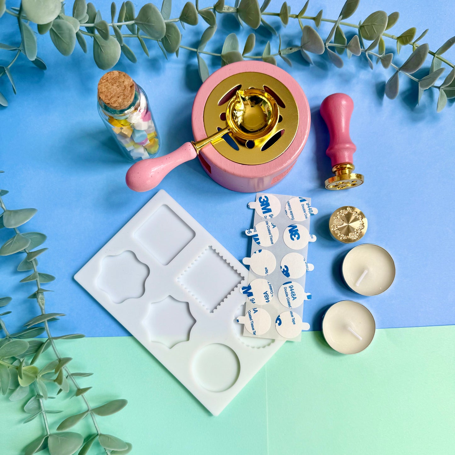 DIY wax sealing kit contents arranged on desk