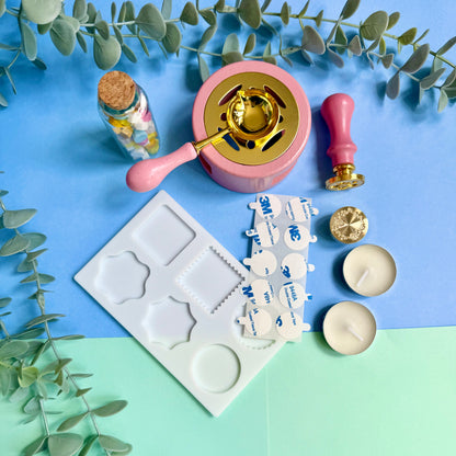 DIY wax sealing kit contents arranged on desk