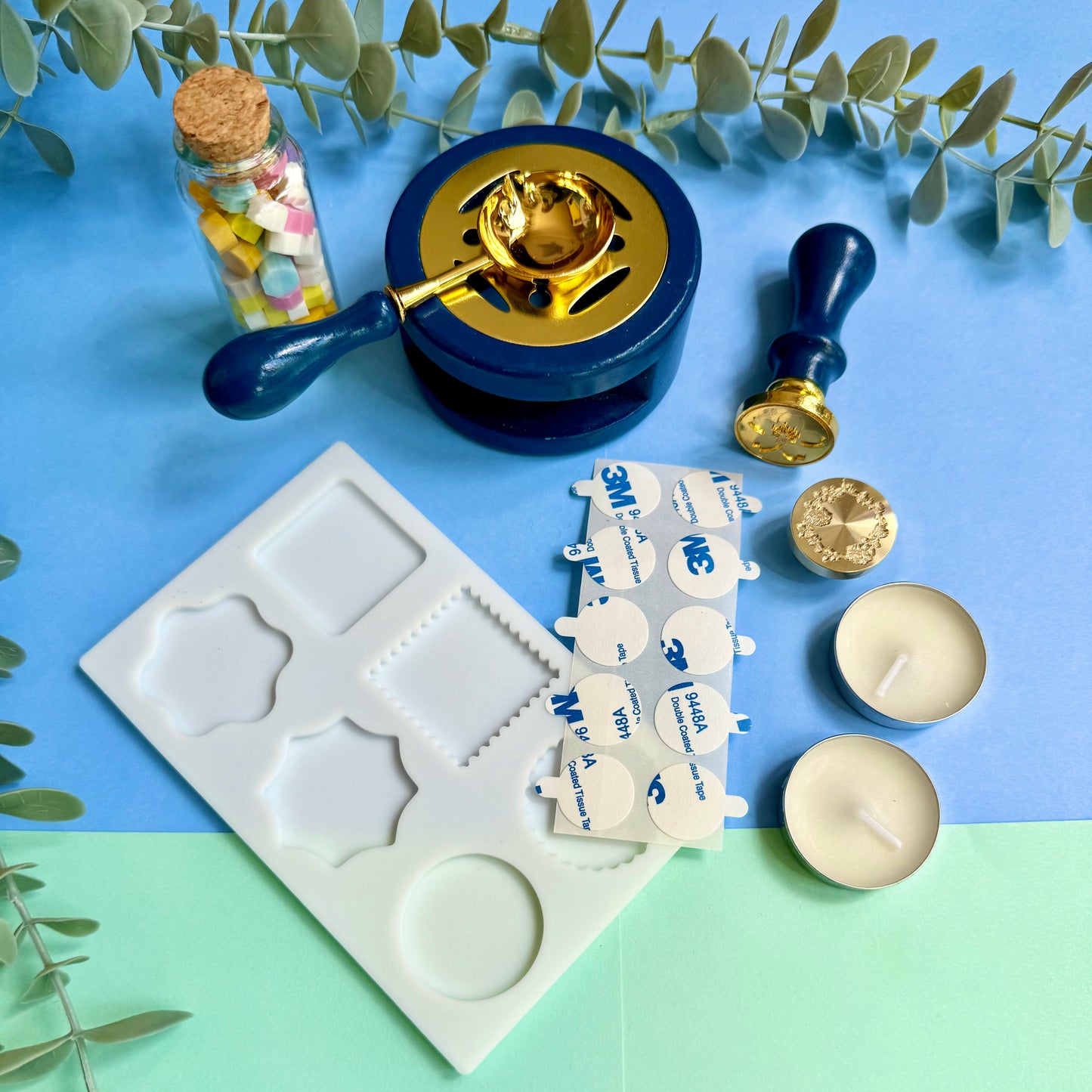 DIY wax sealing kit contents arranged on desk