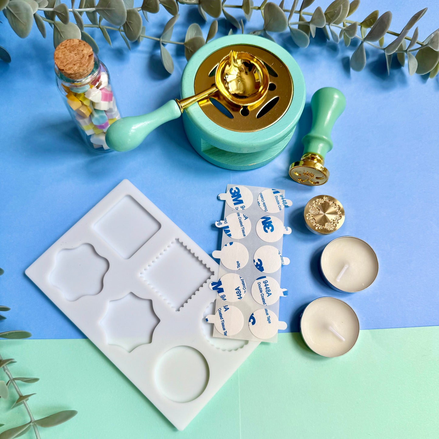 DIY wax sealing kit contents arranged on desk