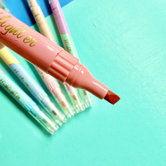 Close-up of pink double-ended highlighter chisel tip